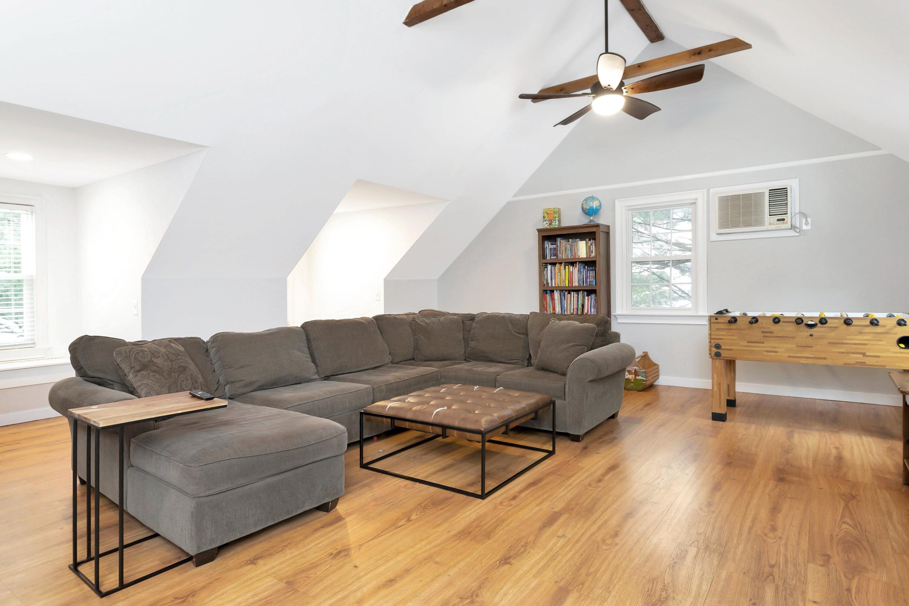2 Red Barn Road Darien, CT 06820 - Photo 22 of 38 a living room with furniture and a wooden floor