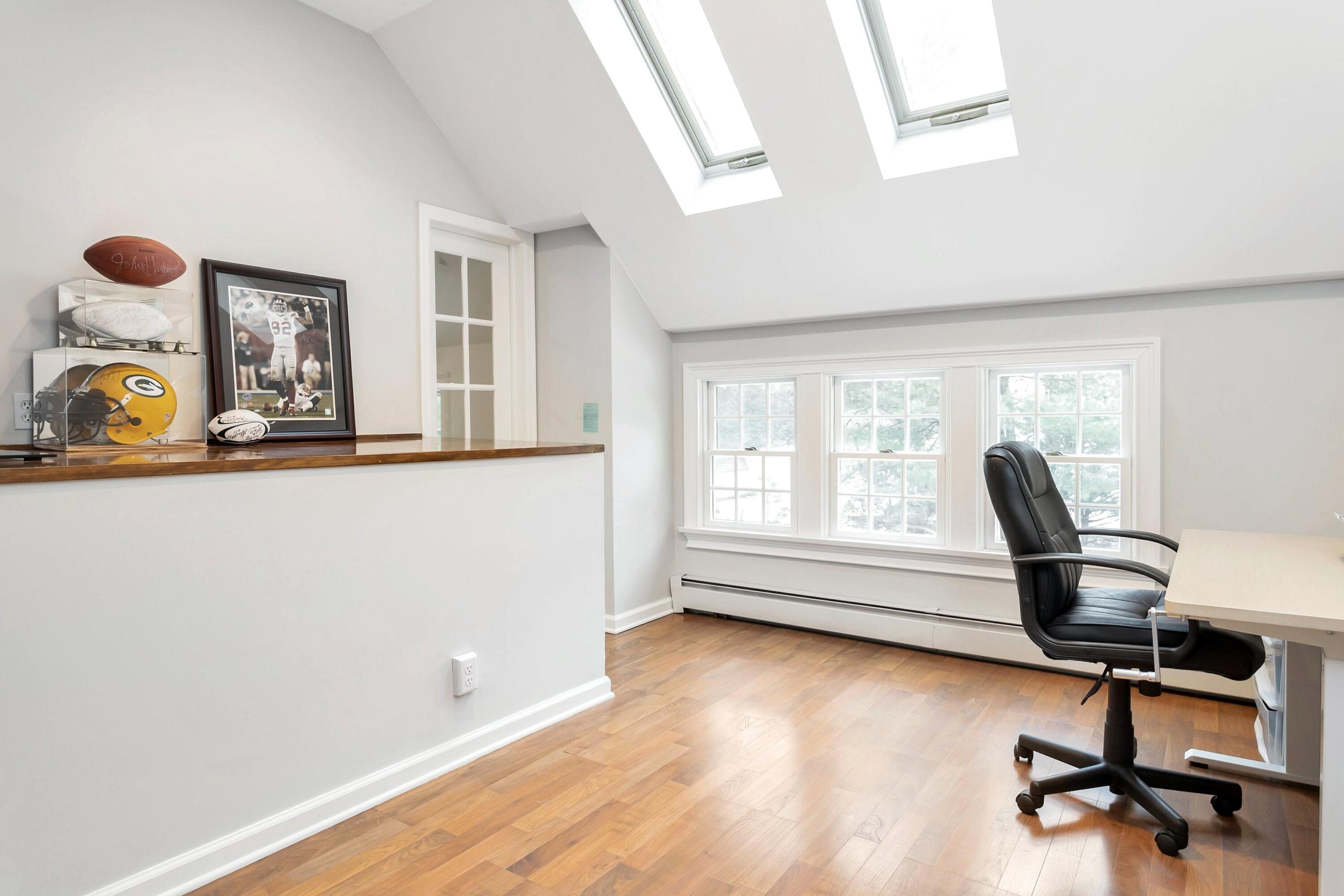 2 Red Barn Road Darien, CT 06820 - Photo 25 of 38 a view of a workspace with furniture and a window