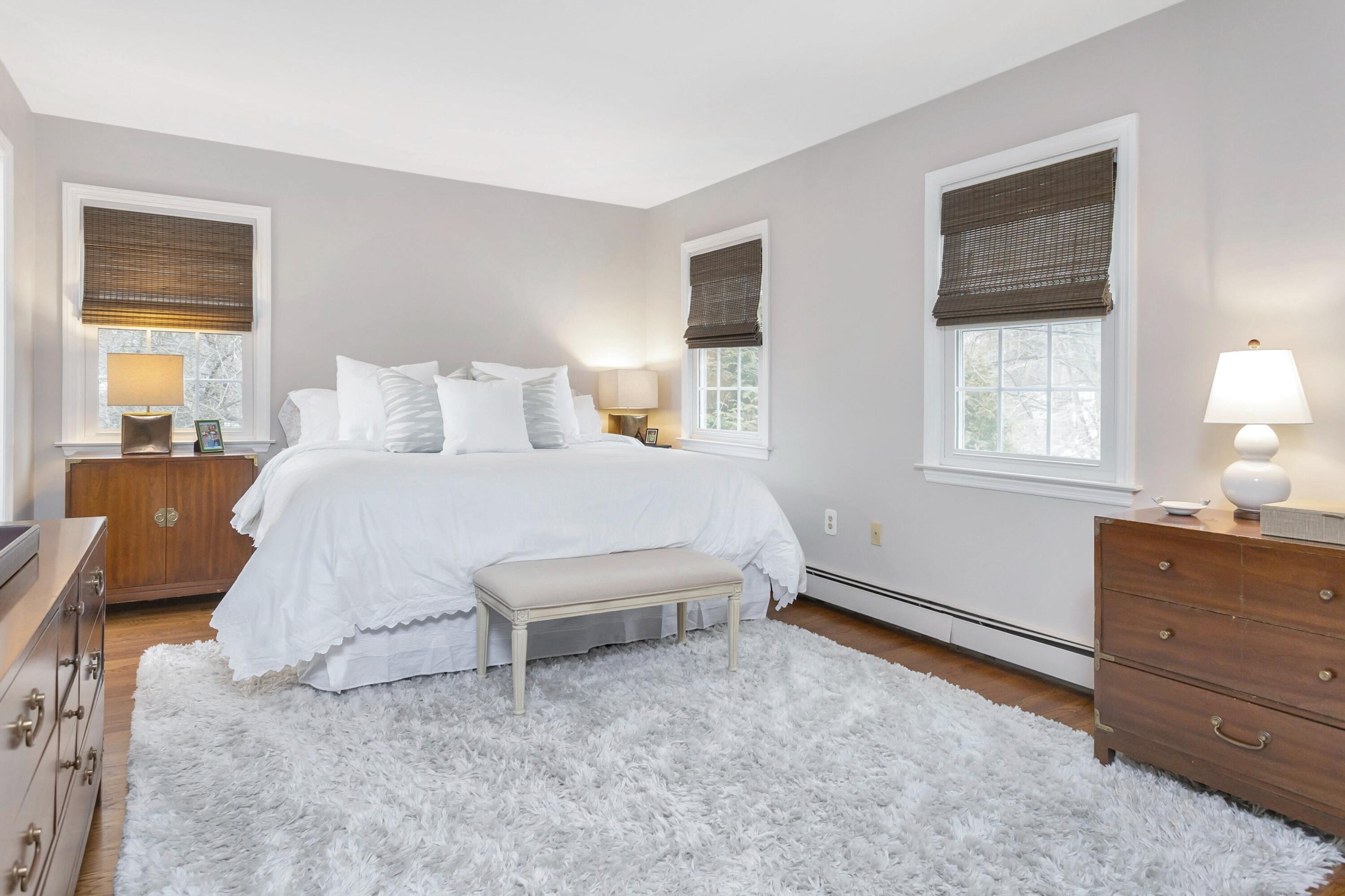 2 Red Barn Road Darien, CT 06820 - Photo 26 of 38 a bedroom with a bed dresser and a window