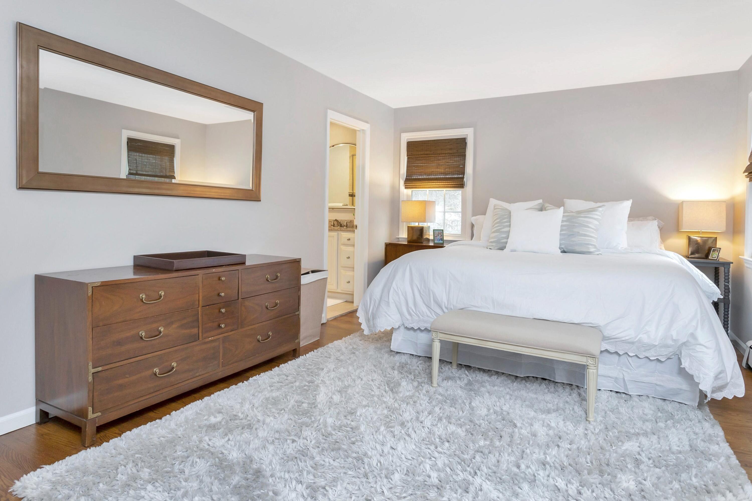 2 Red Barn Road Darien, CT 06820 - Photo 27 of 38 a bedroom with a bed and a night stand