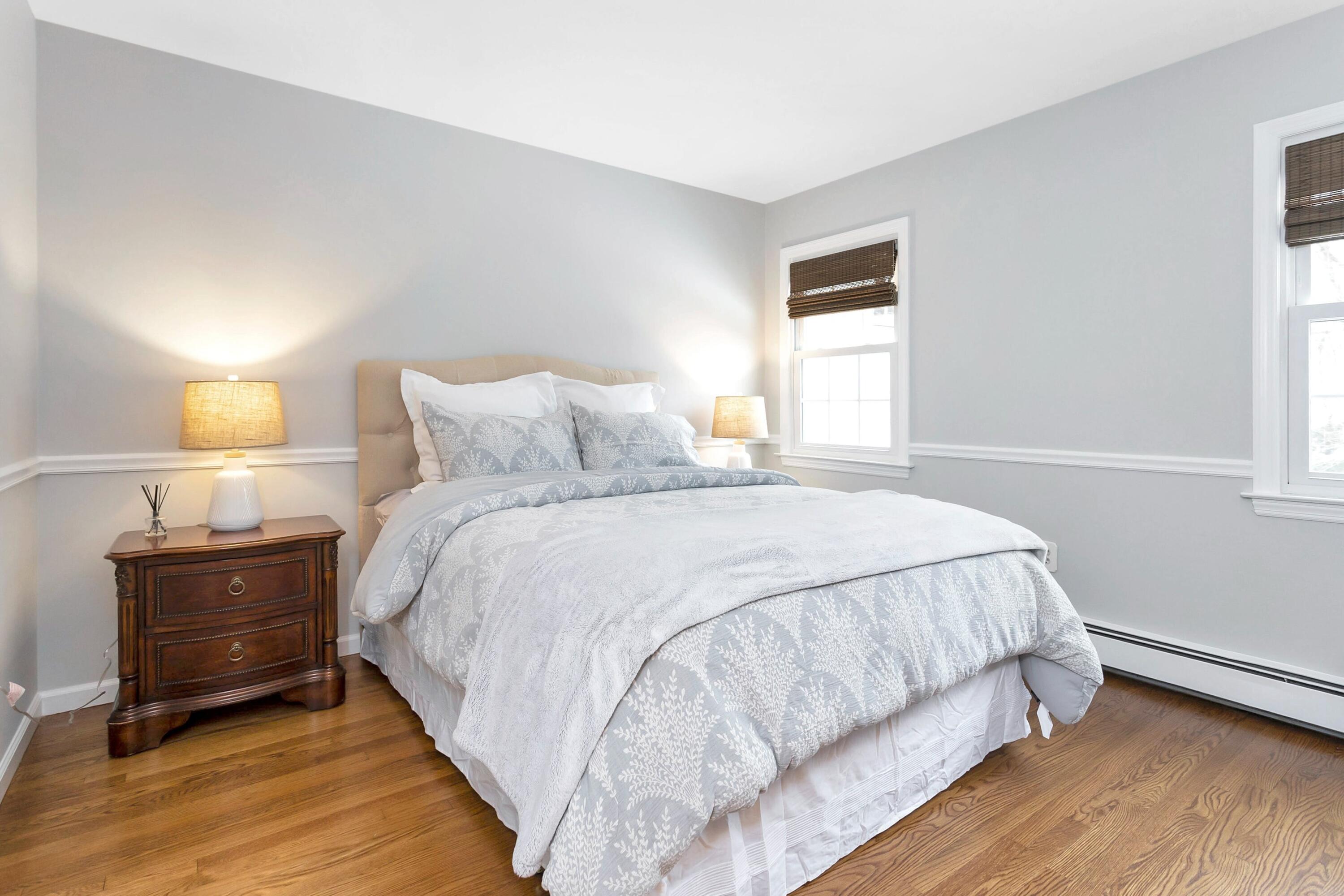 2 Red Barn Road Darien, CT 06820 - Photo 32 of 38 a bedroom with a bed and window