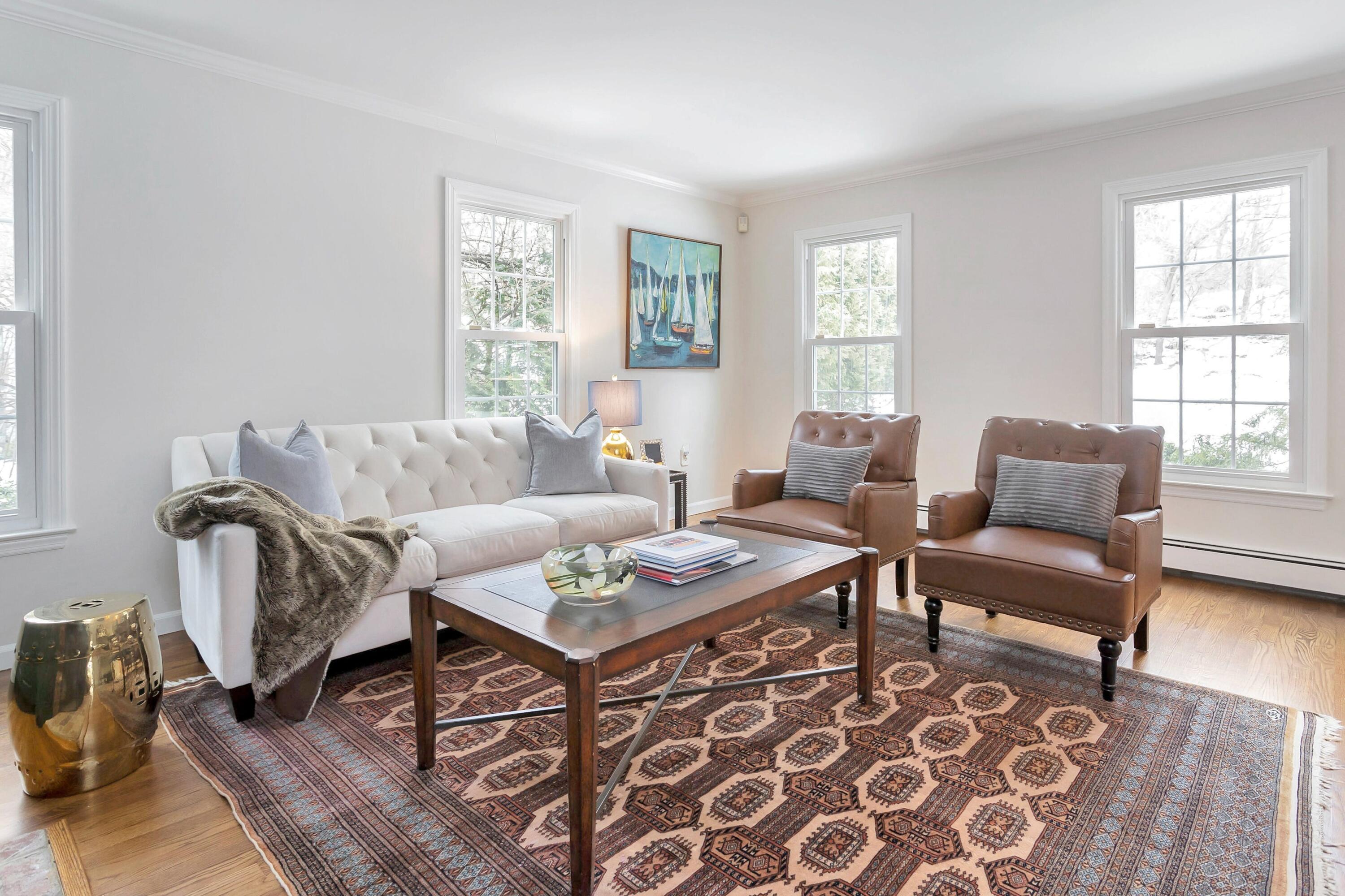 2 Red Barn Road Darien, CT 06820 - Photo 6 of 38 a living room with furniture and wooden floor
