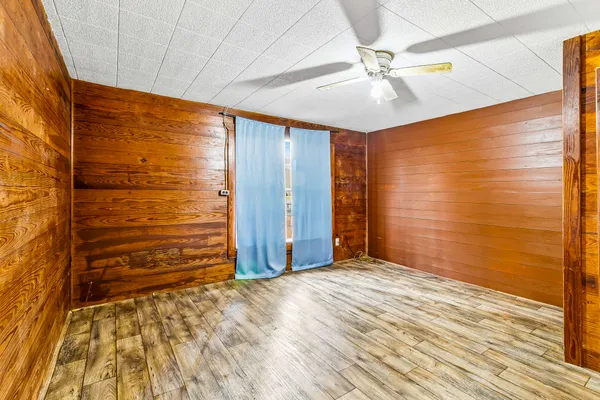 a view of a livingroom with a white walls
