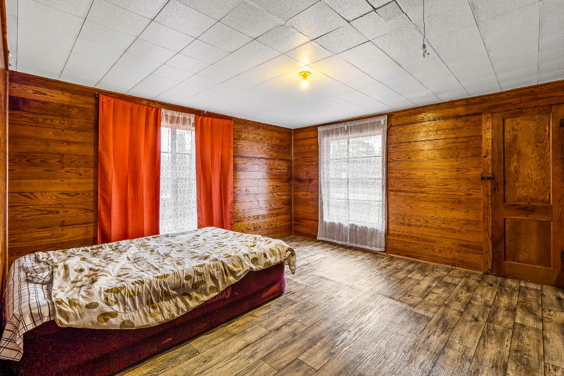24103 Highway 59 Corrigan, TX 75939 - Photo 14 of 27 a bedroom with a bed and a walk in closet