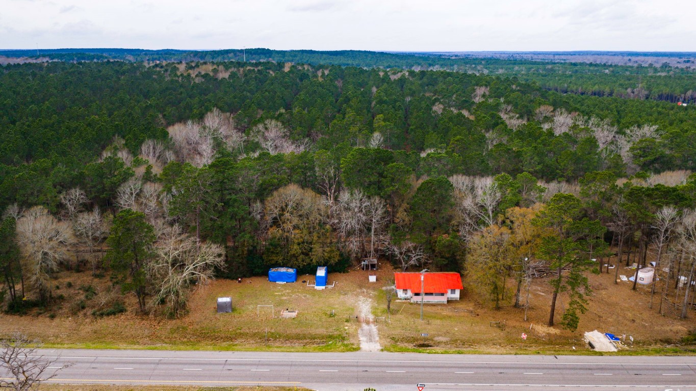 24103 Highway 59 Corrigan, TX 75939 - Photo 24 of 27 a view of a floor to ceiling window and an outdoor space