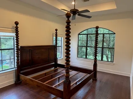 a room with window and wooden floor