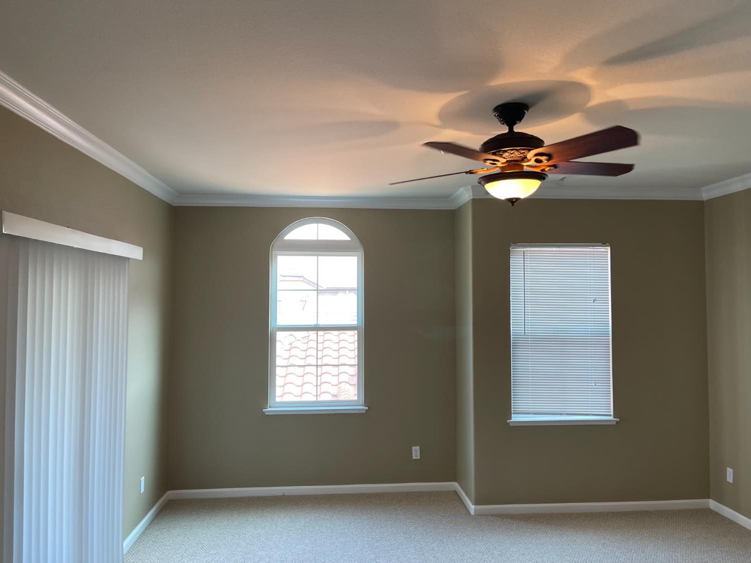72 South Rio Rapido Drive Tracy, CA 95391 - Photo 13 of 24 an empty room with a window and a ceiling fan
