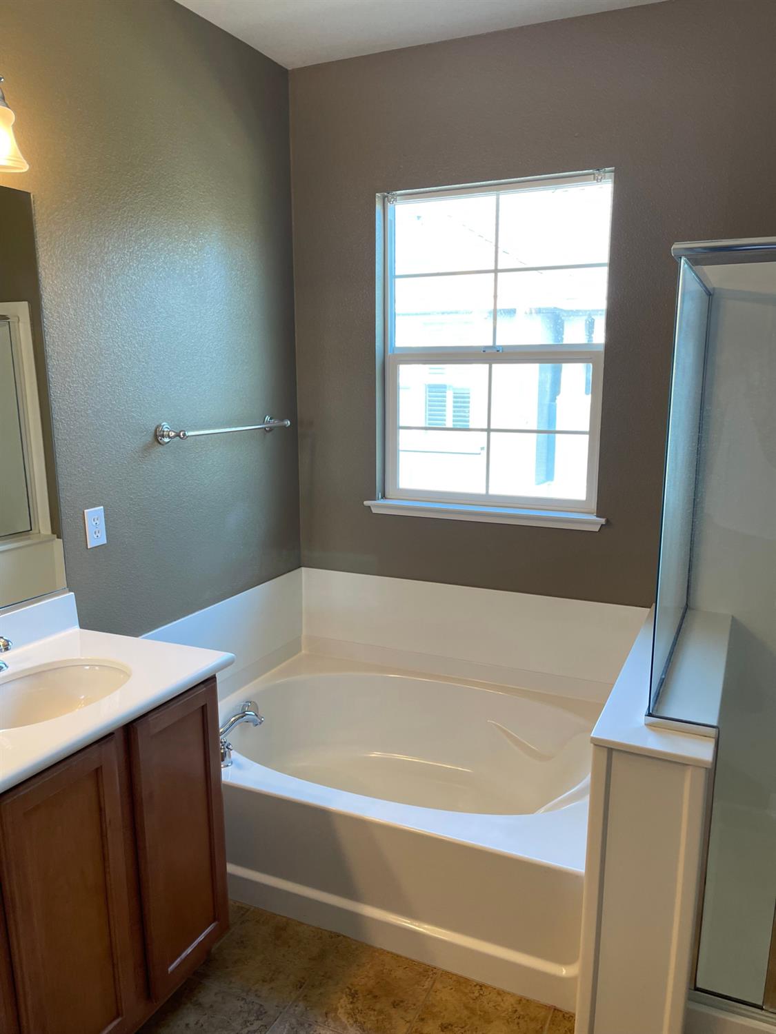 72 South Rio Rapido Drive Tracy, CA 95391 - Photo 16 of 24 a white bath tub sitting next to a white sink