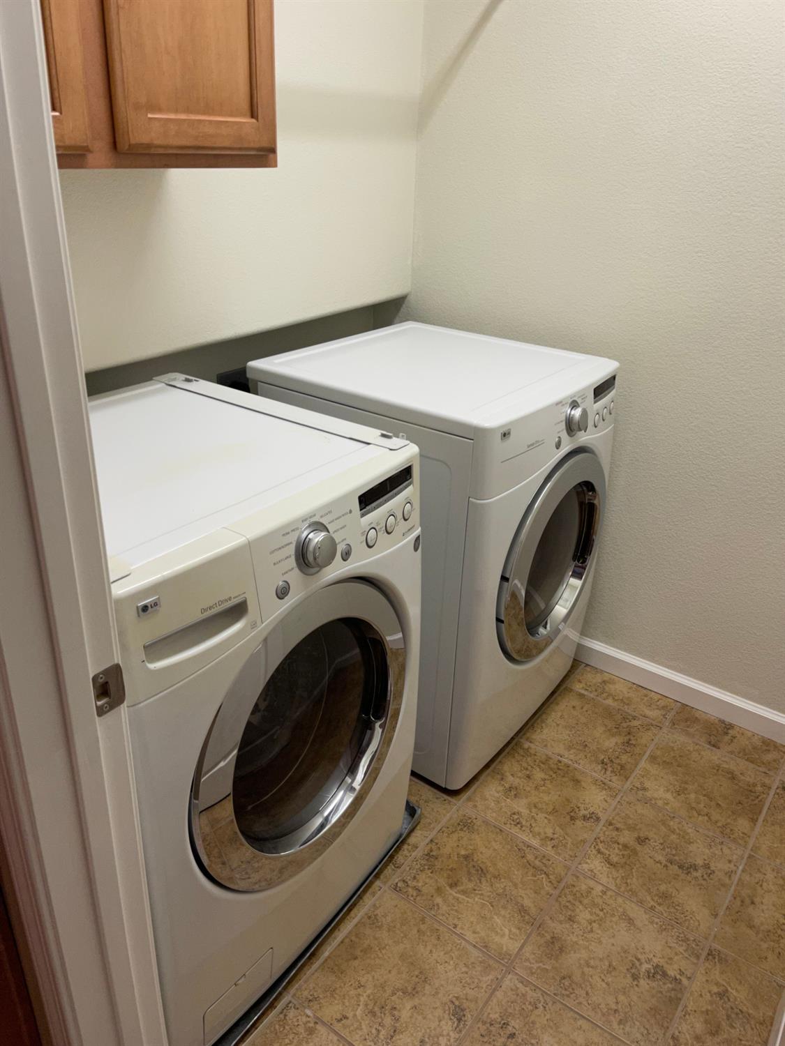 72 South Rio Rapido Drive Tracy, CA 95391 - Photo 19 of 24 a utility room with dryer and washer