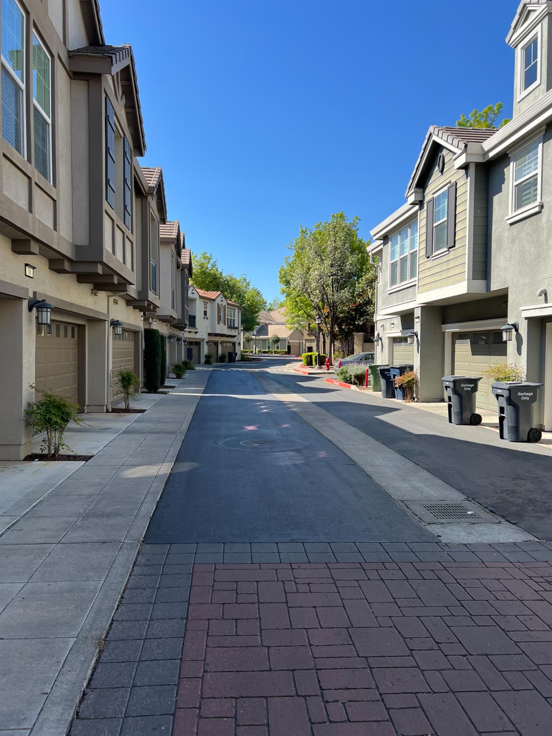72 South Rio Rapido Drive Tracy, CA 95391 - Photo 20 of 24 a city street lined with buildings and trees