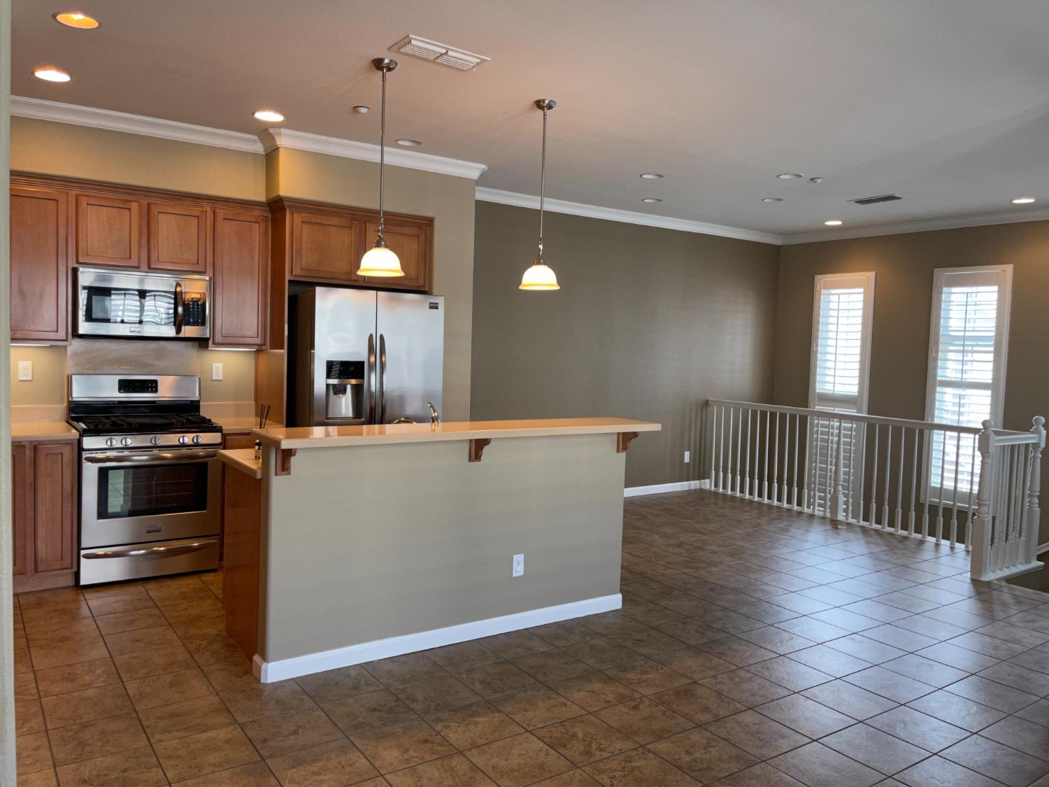 72 South Rio Rapido Drive Tracy, CA 95391 - Photo 8 of 24 a view of a kitchen with a sink and a stove top oven