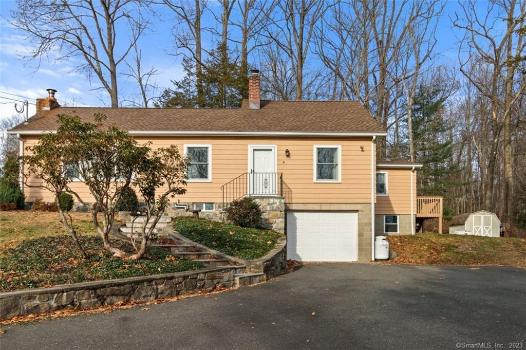 a view of a house with a street
