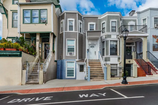 a view of a building with a street