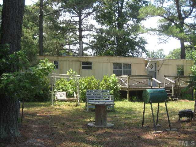 8621 Old Stage Road Raleigh, NC 27603 - Photo 16 of 25 Another renal mobile home, bringing in $500 per month.