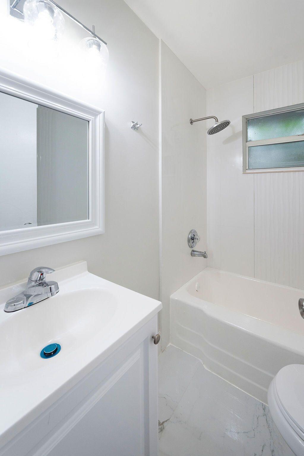 1883 Smith Drive, Unit 2 Juno Ridge, FL 33408 - Photo 3 of 5 smith 4