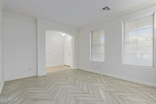 a view of a chandelier in an empty room