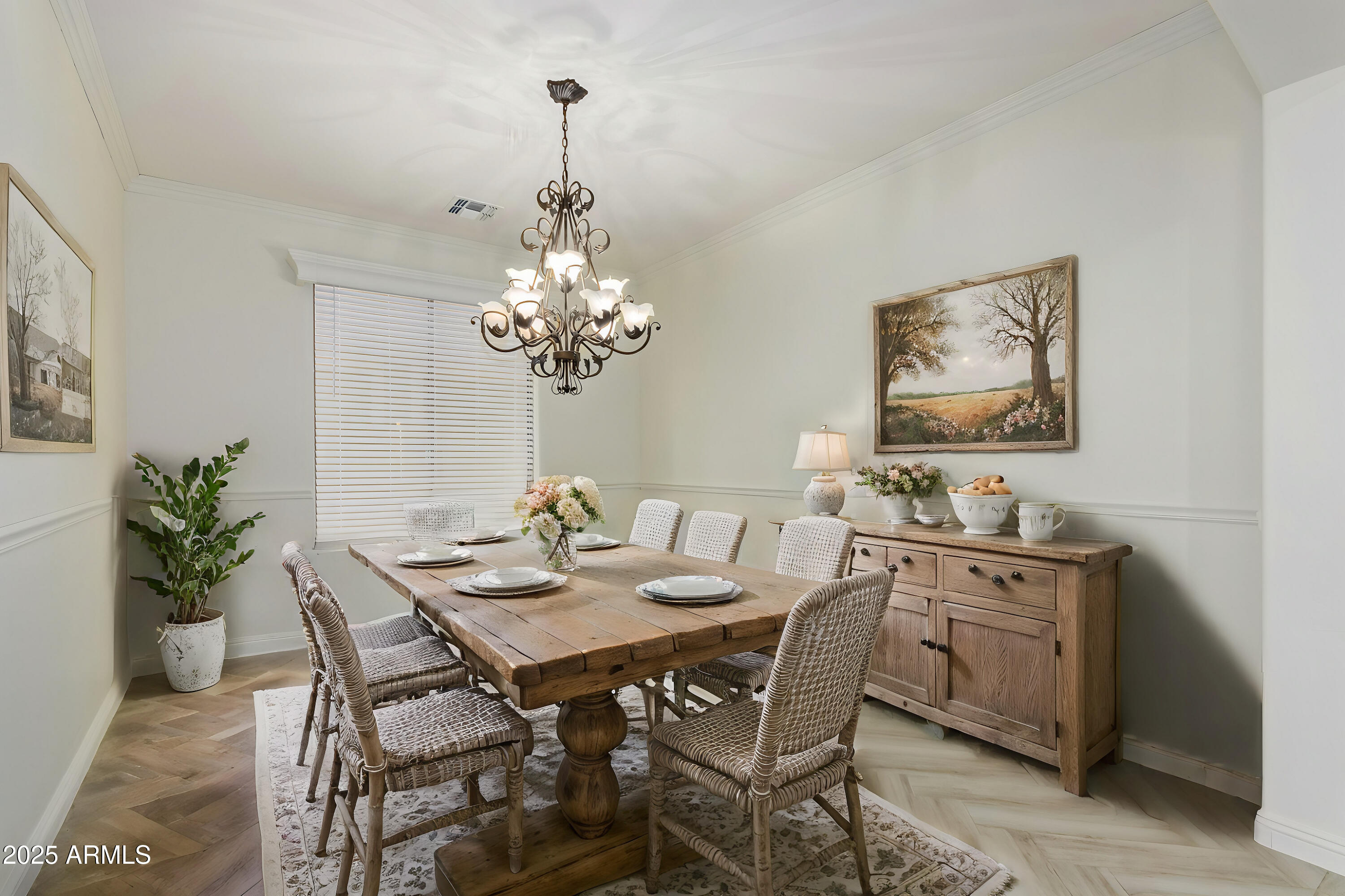 13635 West Calavar Road Surprise, AZ 85379 - Photo 18 of 76 a view of a dining room with furniture and chandelier