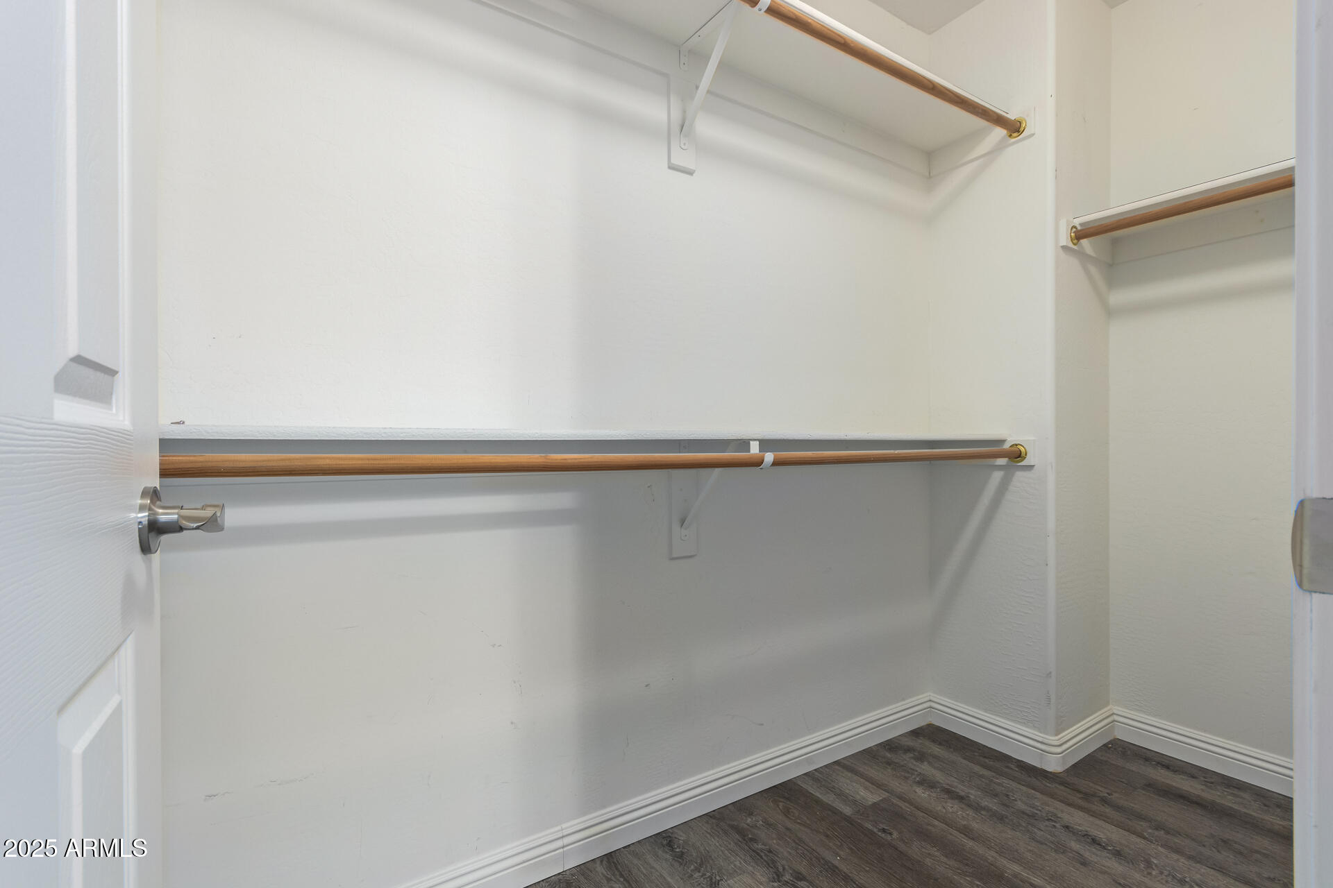 13635 West Calavar Road Surprise, AZ 85379 - Photo 58 of 76 a view of a room with wooden floor