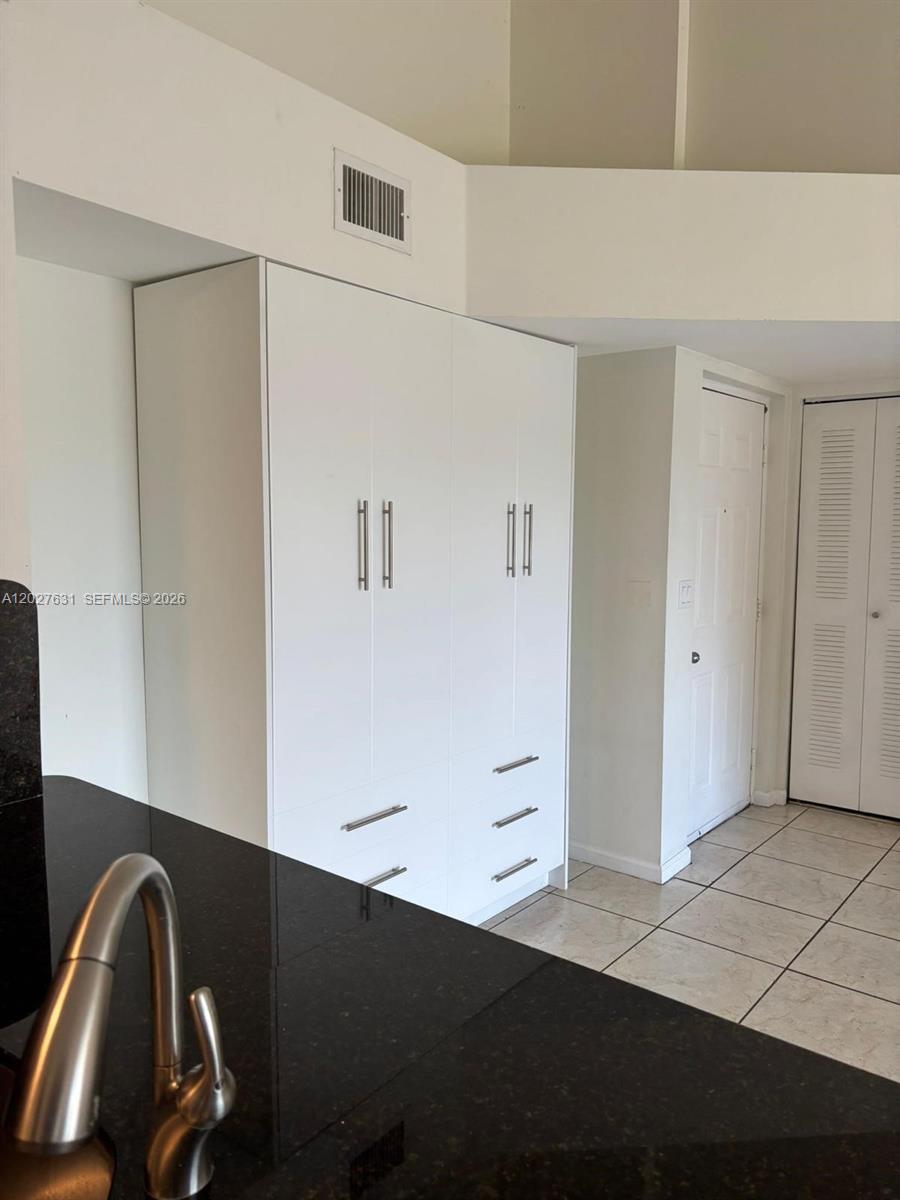 2081 Renaissance Boulevard, Unit 306 Miramar, FL 33025 - Photo 15 of 22 a view of workspace with closet