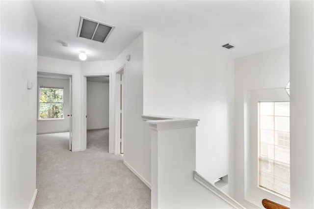 a view of entryway with bathroom