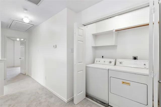 a view of utility room with washer and dryer
