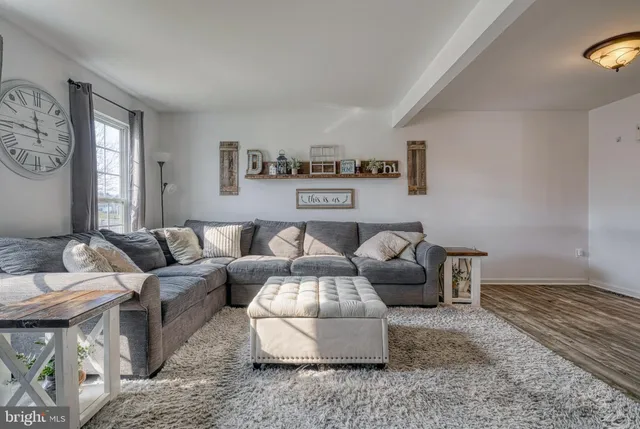 a living room with furniture and a couch
