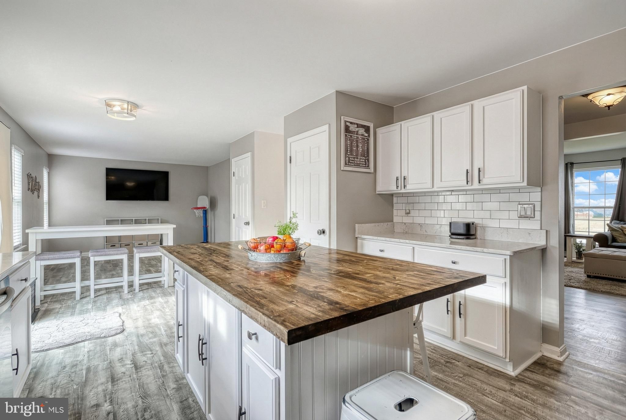 112 Farm Ln Circle York, PA 17408 - Photo 21 of 49 a kitchen with a stove a sink and a refrigerator