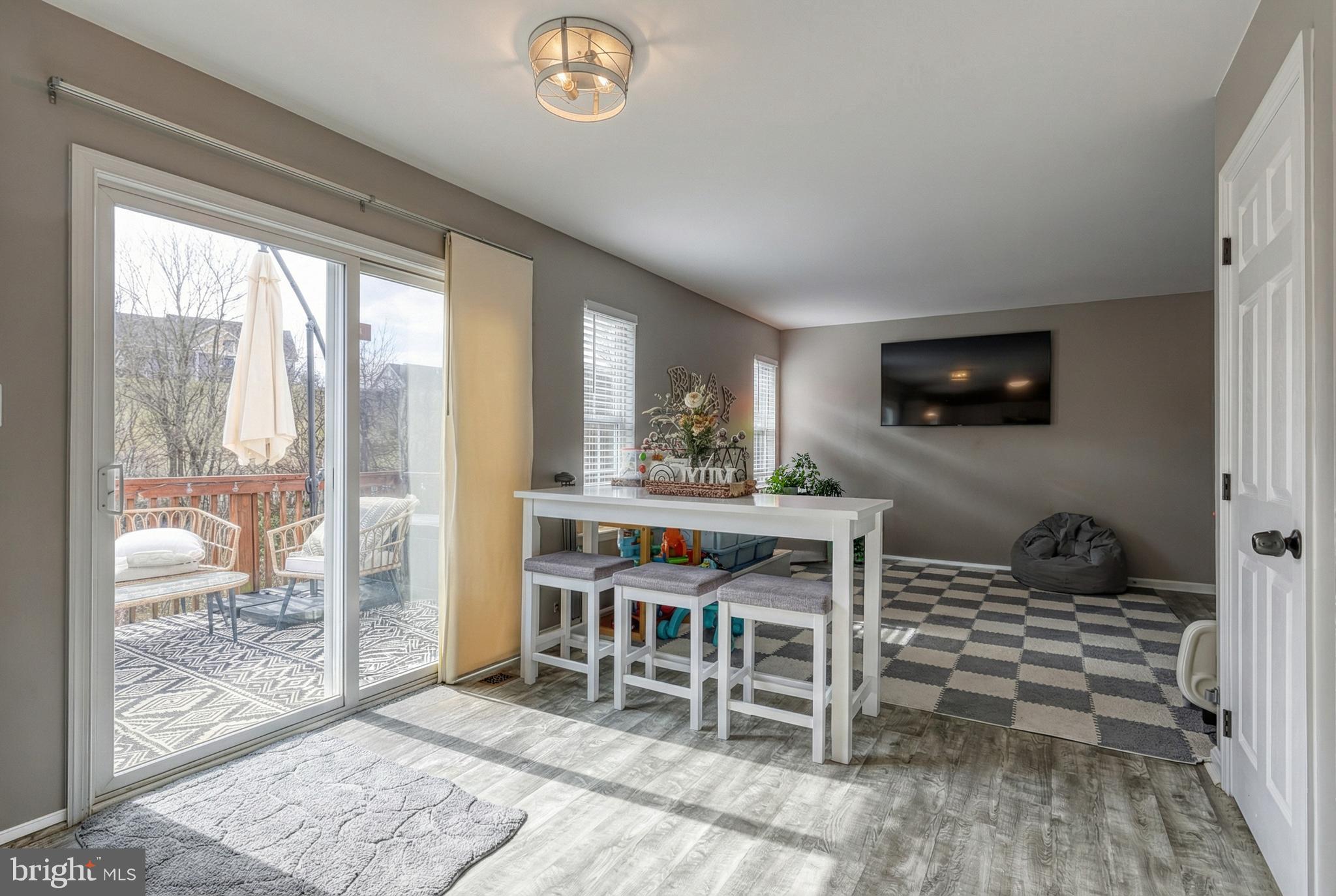112 Farm Ln Circle York, PA 17408 - Photo 23 of 49 a dining room with furniture window and wooden floor