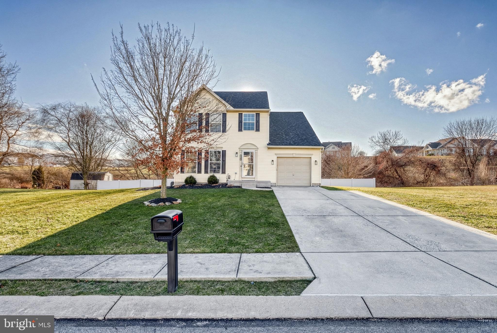 112 Farm Ln Circle York, PA 17408 - Photo 3 of 49 a front view of a house with a yard