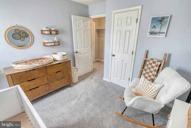 a bedroom with a bed and furniture