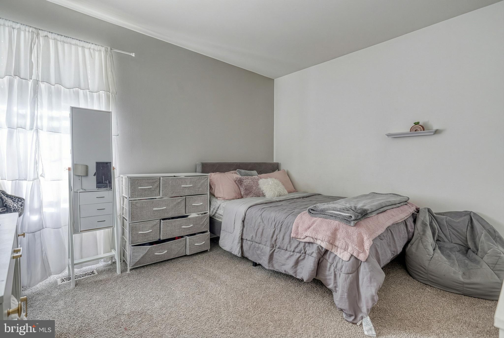 112 Farm Ln Circle York, PA 17408 - Photo 35 of 49 a bedroom with a bed and a cabinets