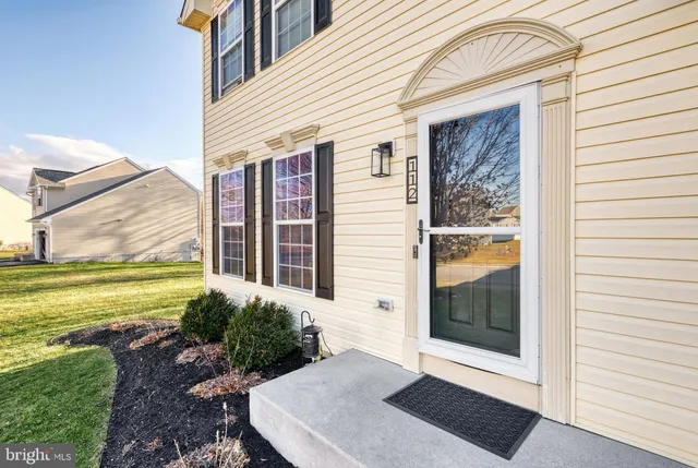 a view of a back yard of the house