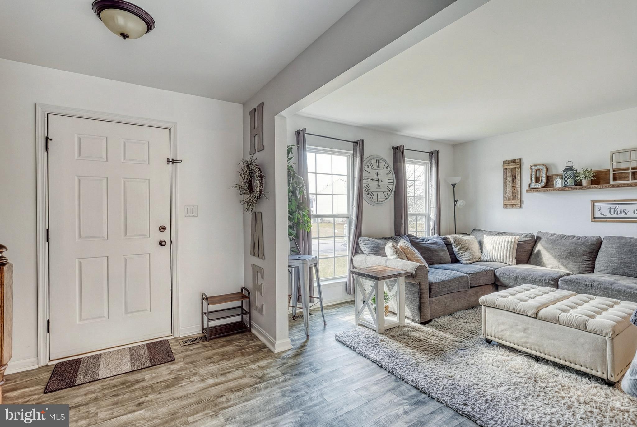 112 Farm Ln Circle York, PA 17408 - Photo 9 of 49 a living room with furniture and wooden floor