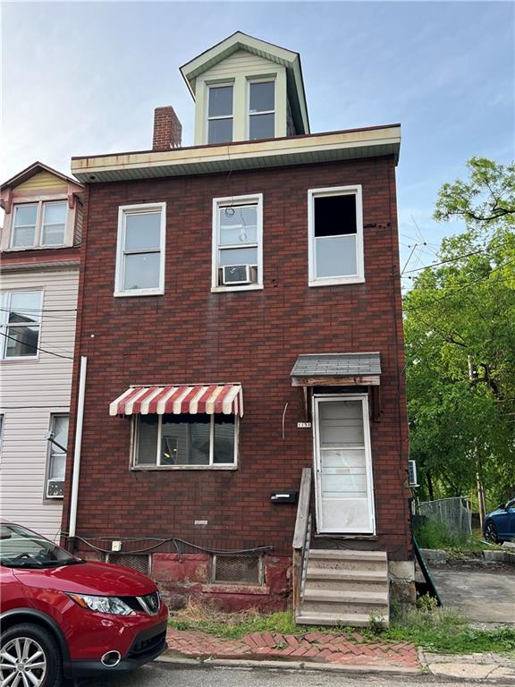 1150 Goettmann Street Pittsburgh, PA 15212 - Photo 2 of 49 a front view of a house with a yard