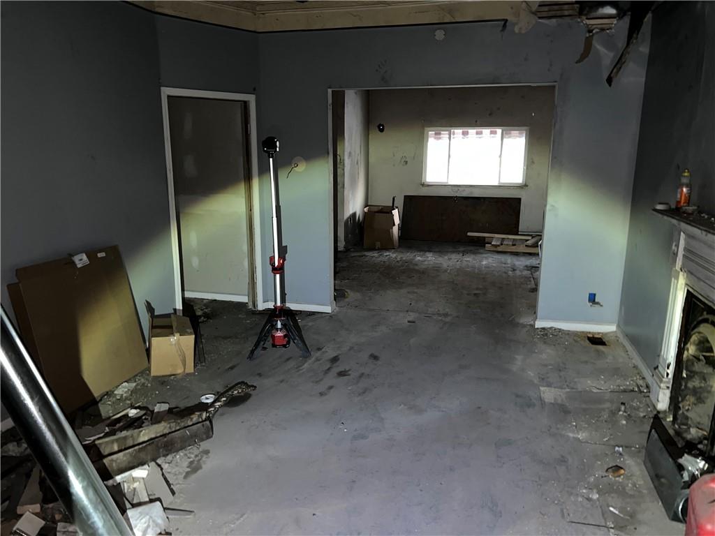 1150 Goettmann Street Pittsburgh, PA 15212 - Photo 24 of 49 a room with gym equipment and a flat screen tv