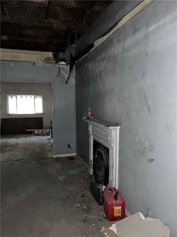 1150 Goettmann Street Pittsburgh, PA 15212 - Photo 25 of 49 a living room with furniture and a fireplace