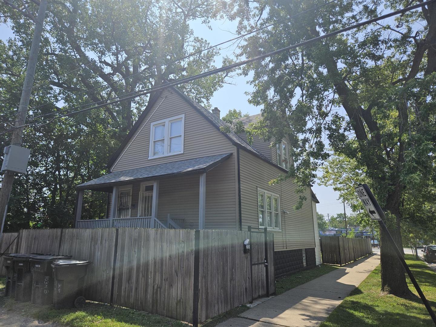 1024 West 87th Street Chicago, IL 60620 - Photo 2 of 10 a house that has tree in front of it