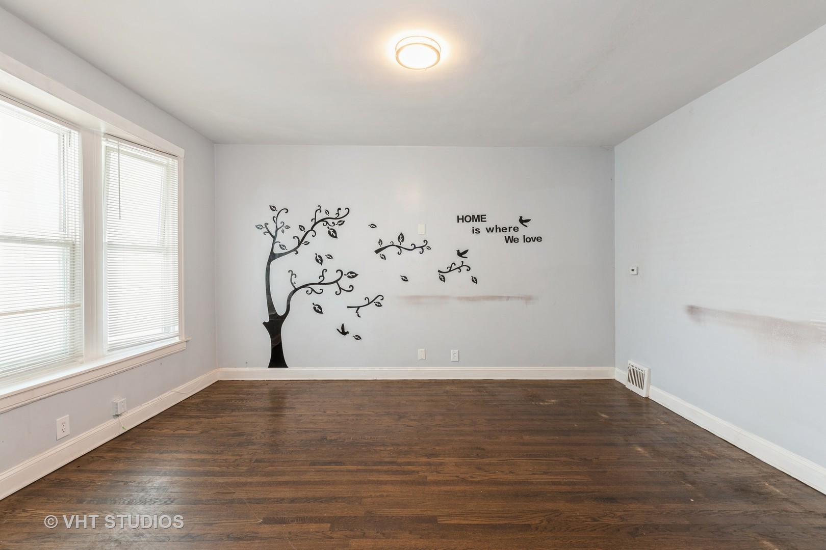 1024 West 87th Street Chicago, IL 60620 - Photo 3 of 10 a view of wooden floor in a room