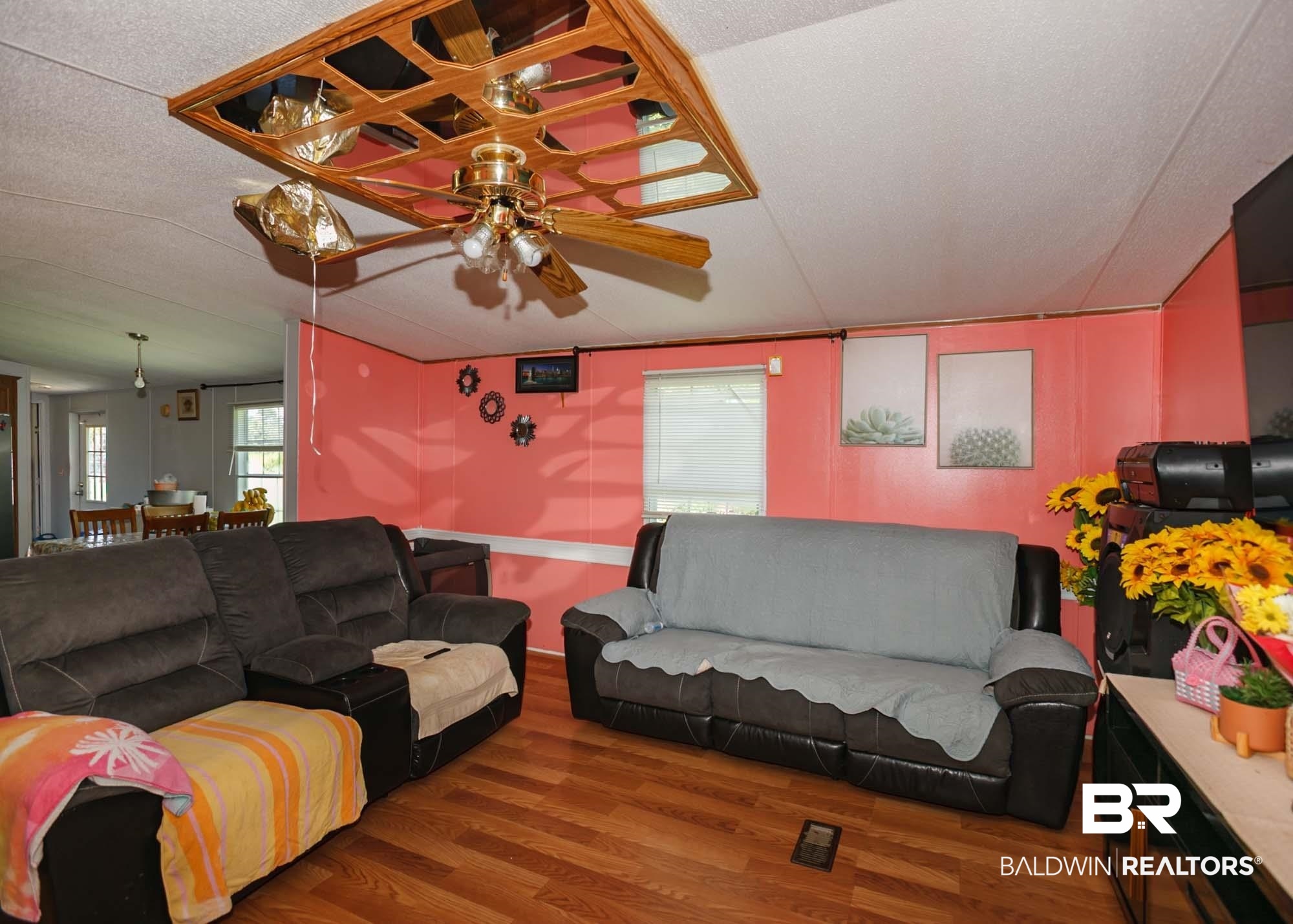 14005 County Road 49 Foley, AL 36535 - Photo 11 of 38 Living room featuring a ceiling fan, wood finished floors, and a textured ceiling