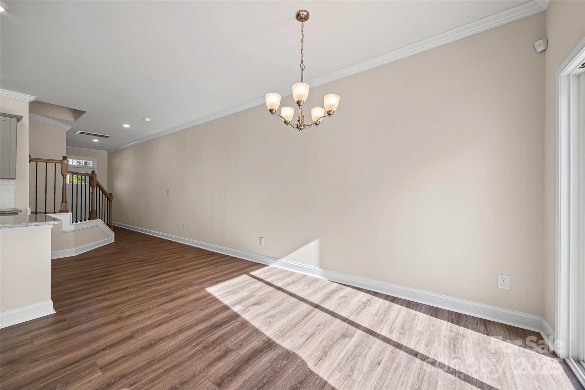 1018 Chicory Trace Clover, SC 29710 - Photo 12 of 37 a view of a room with wooden floor and ceiling fan