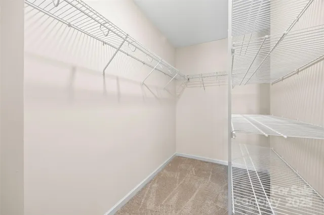 a view of a room with racks on the wall