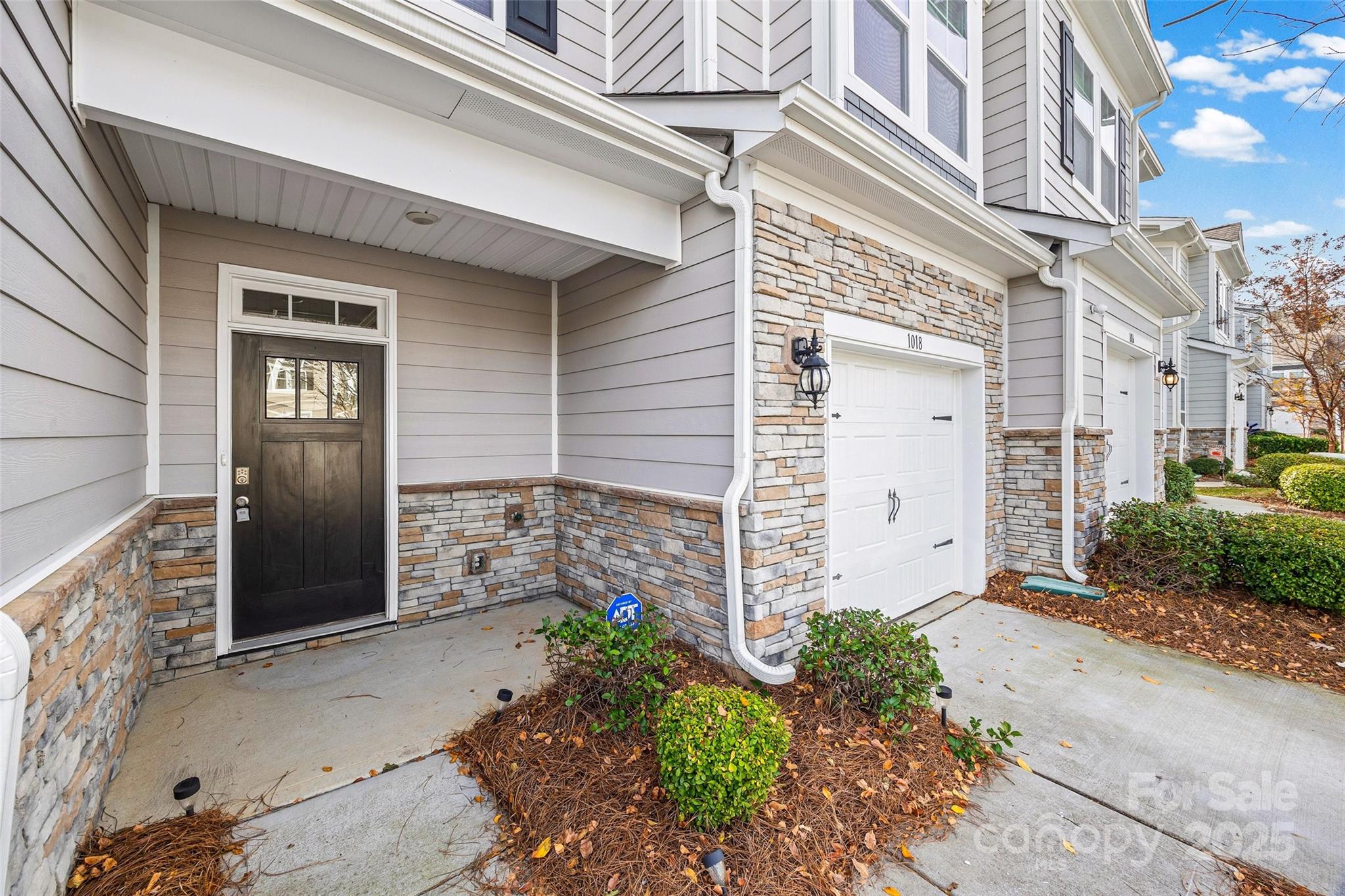 1018 Chicory Trace Clover, SC 29710 - Photo 2 of 37 a front view of a house with a yard