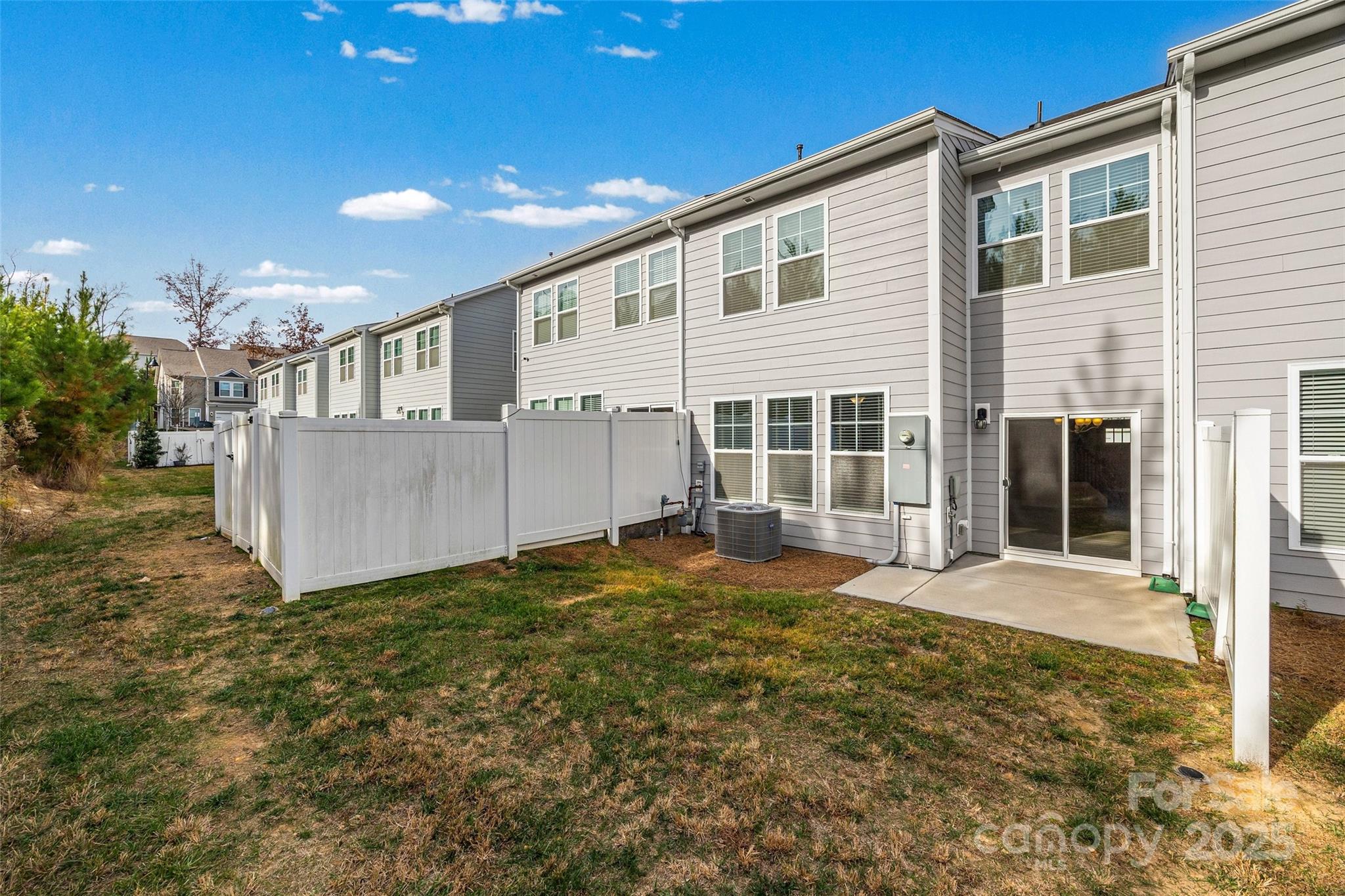1018 Chicory Trace Clover, SC 29710 - Photo 27 of 37 a view of a house with backyard and sitting area