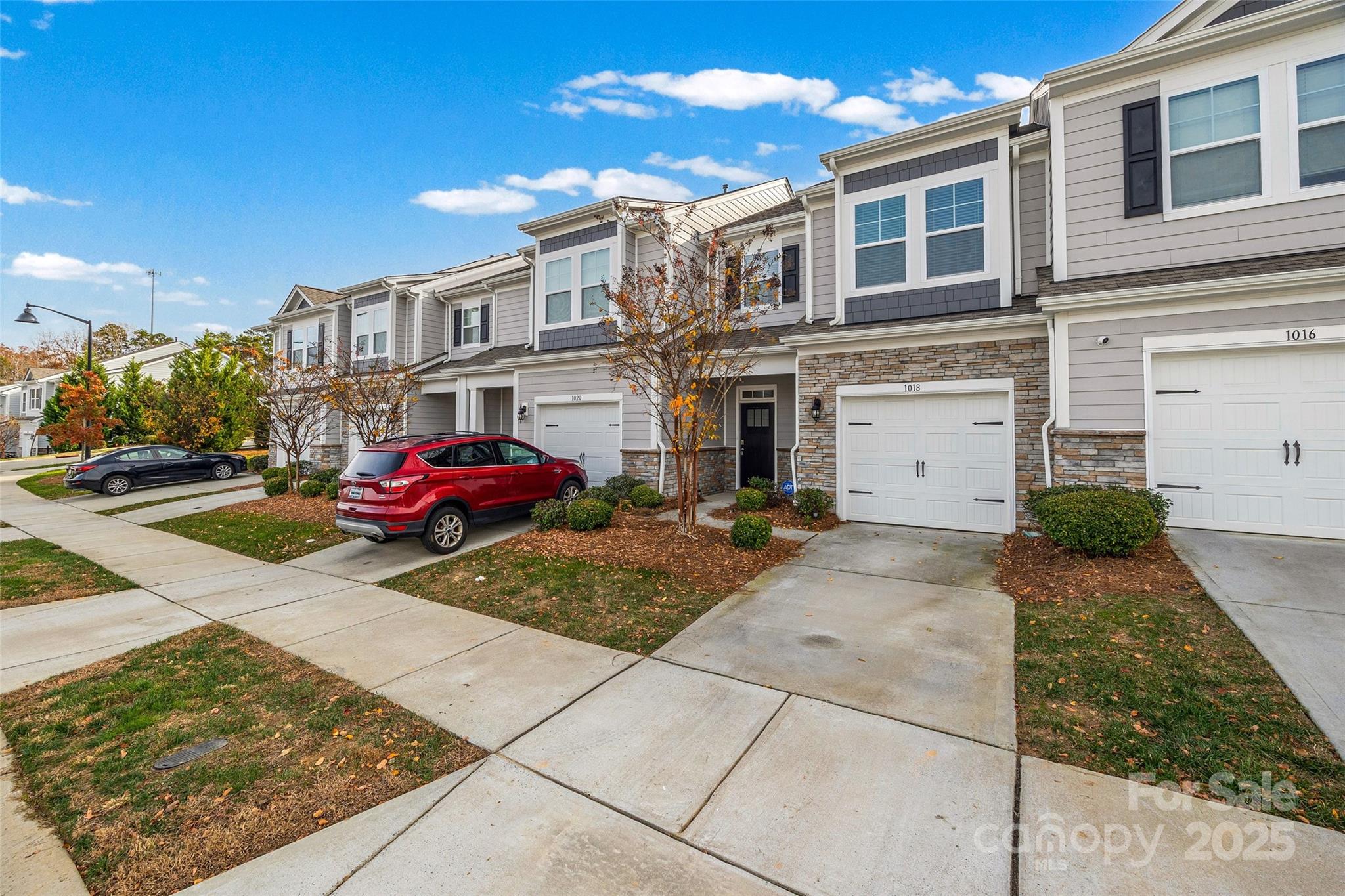 1018 Chicory Trace Clover, SC 29710 - Photo 28 of 37 a view of a street with a building in the background