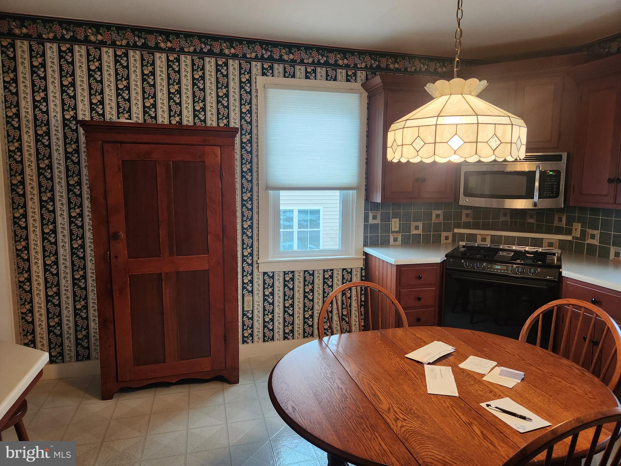 123 North 11th Street Akron, PA 17501 - Photo 16 of 43 a view of a dining room with furniture window and wooden floor