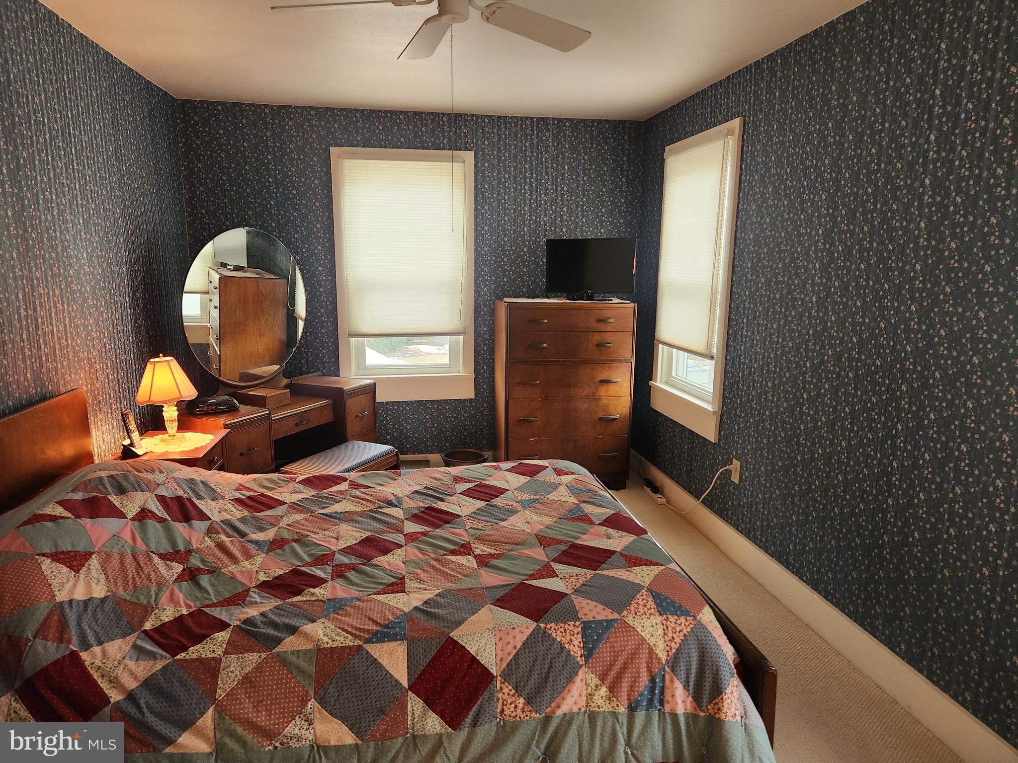 123 North 11th Street Akron, PA 17501 - Photo 21 of 43 a bedroom with a bed and wooden floor