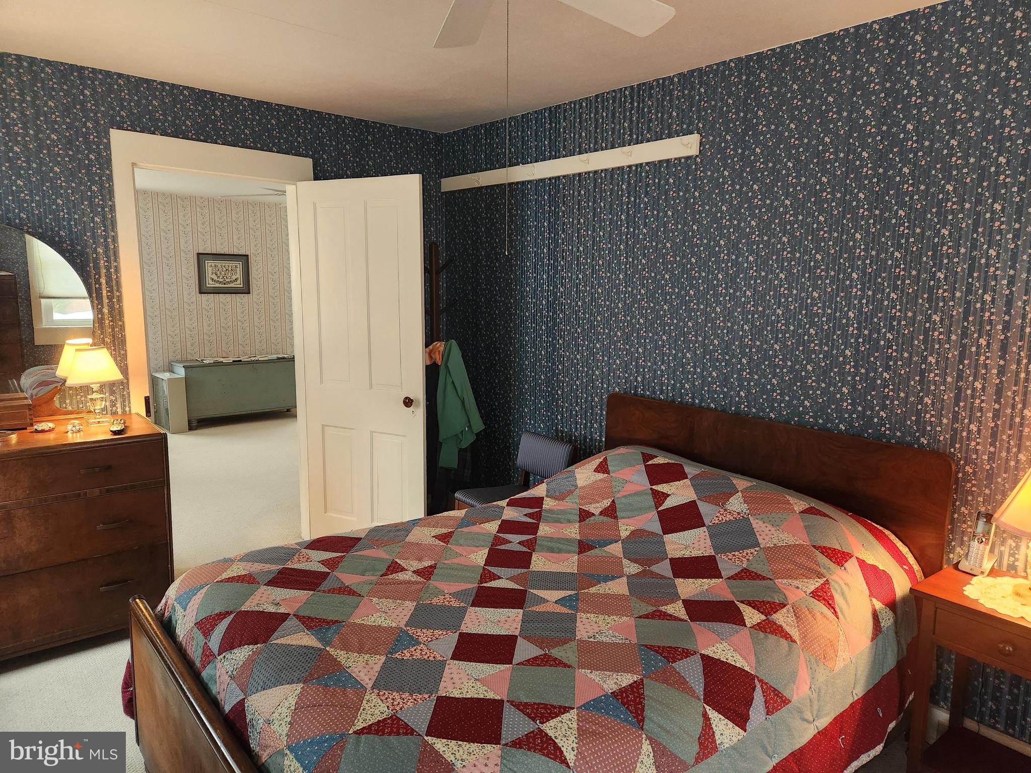 123 North 11th Street Akron, PA 17501 - Photo 22 of 43 a bedroom with a bed and a mirror