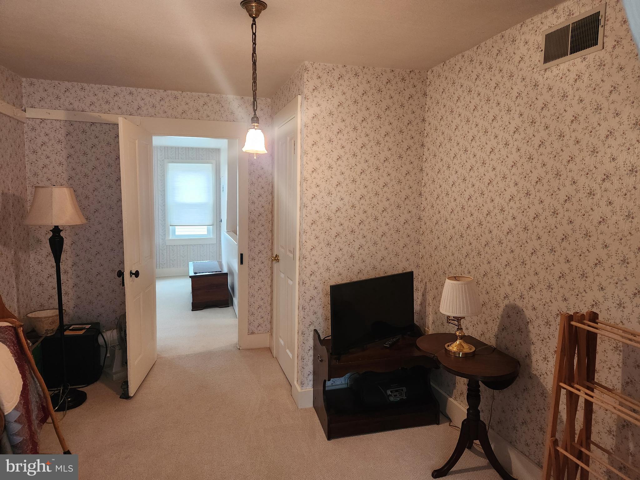 123 North 11th Street Akron, PA 17501 - Photo 24 of 43 a view of a livingroom with furniture and a flat screen tv
