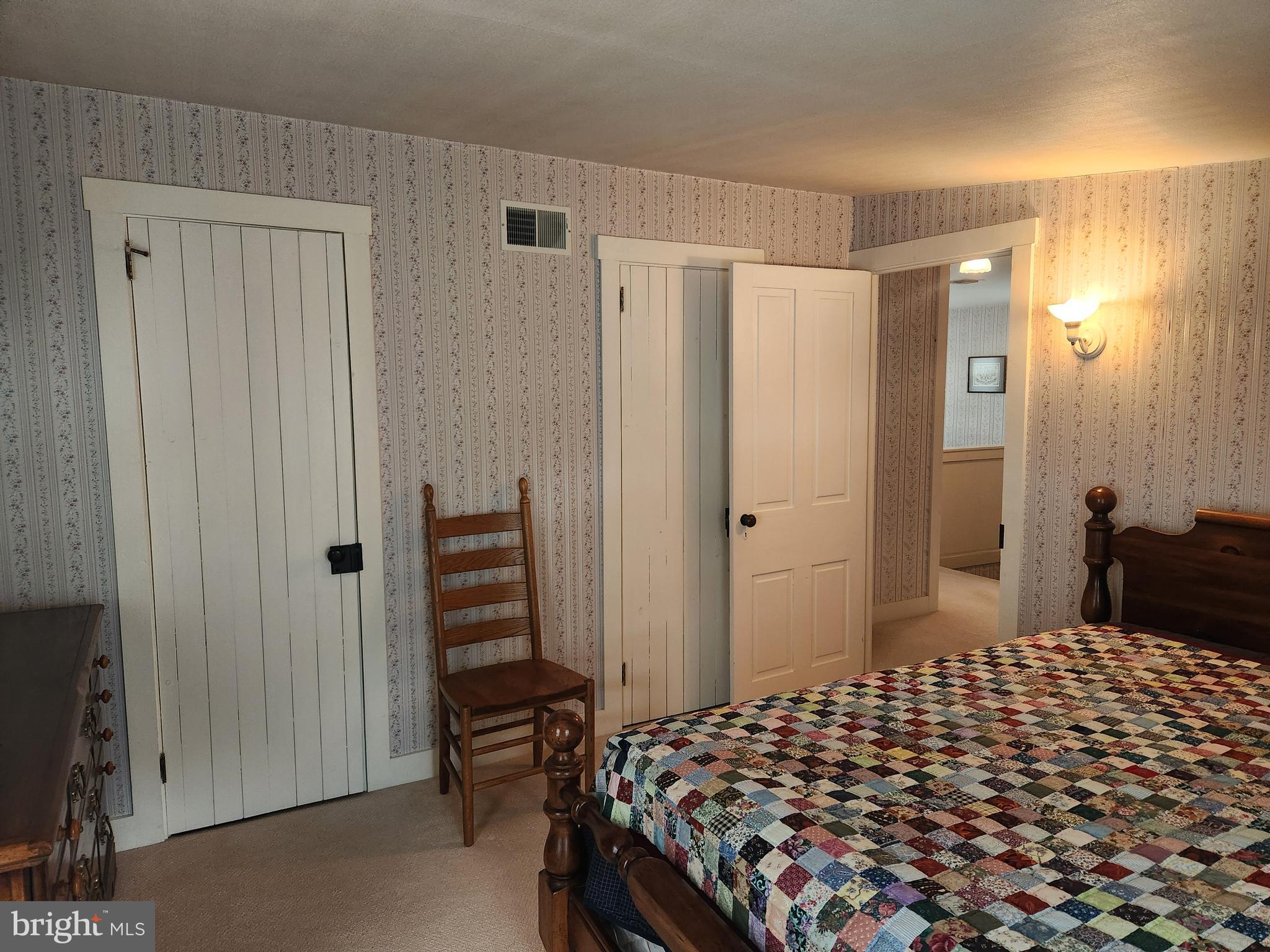 123 North 11th Street Akron, PA 17501 - Photo 26 of 43 a bedroom with a bed and a walk in closet