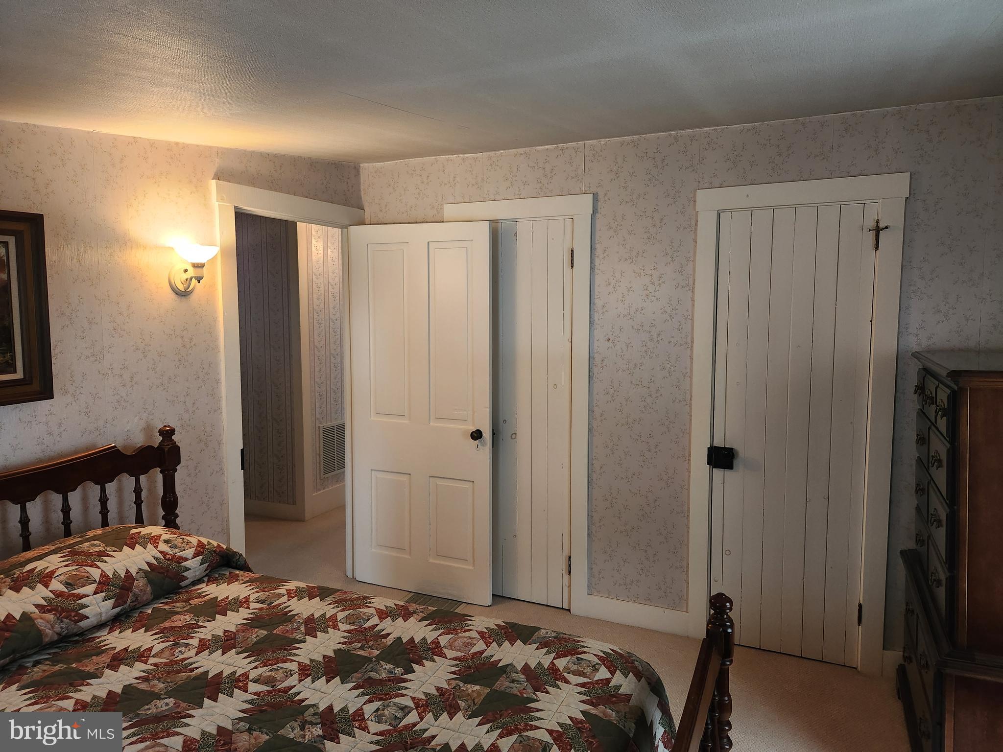 123 North 11th Street Akron, PA 17501 - Photo 30 of 43 a bedroom with a bed and a window